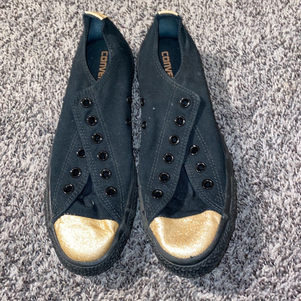 low black and gold converse